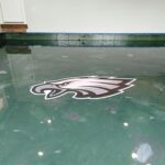 Eagles custom logo on a metallic epoxy floor in South Jersey