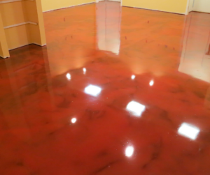 Red metallic floor in a residential basement