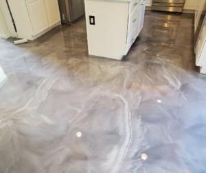 Grey metallic epoxy flooring in a residential kitchen